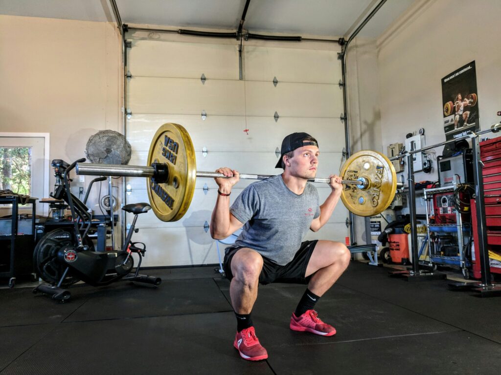 man lifting weights